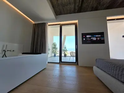 TV o dispositivi per l'intrattenimento presso Skyline Boutique Apartment