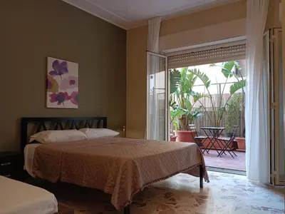 Letto o letti in una camera di Maison Debora Corso Italia whit private parking