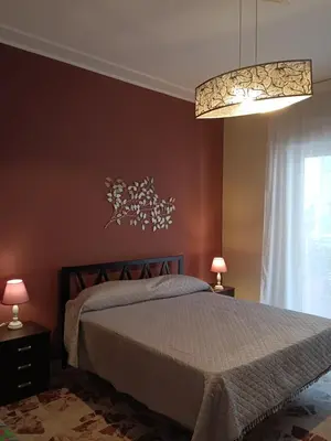 Letto o letti in una camera di Maison Debora Corso Italia whit private parking