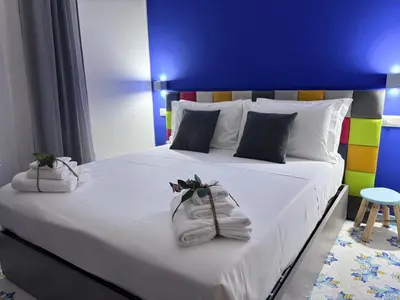 Letto o letti in una camera di Ognissanti Rooms