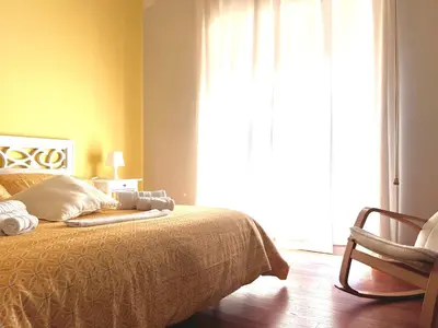 Letto o letti in una camera di L'alloggio dell'Ingegnere