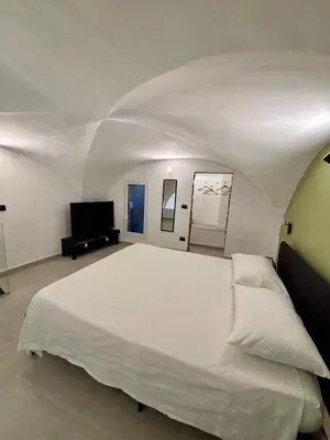 Letto o letti in una camera di MaisonEFFE - Slow Living Catania