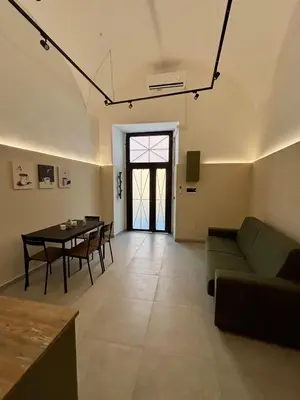 Area soggiorno di MaisonEFFE - Slow Living Catania