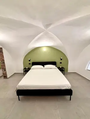 Letto o letti in una camera di MaisonEFFE - Slow Living Catania
