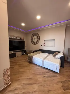 Letto o letti in una camera di Villa Rosaria