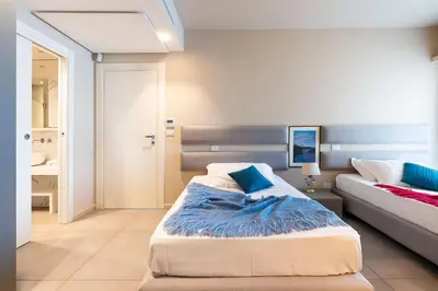 Letto o letti in una camera di Villa Geranio