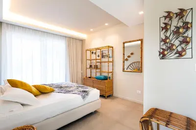 Letto o letti in una camera di Villa Geranio
