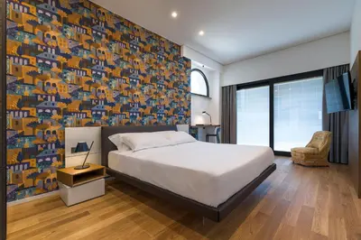 Letto o letti in una camera di Villa Orchidea