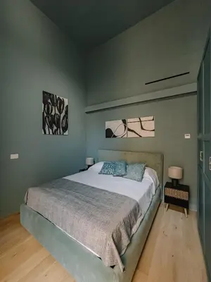 Letto o letti in una camera di Floris & Silva Apartments