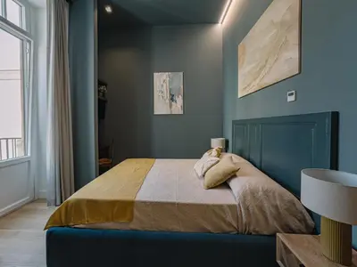 Letto o letti in una camera di Floris & Silva Apartments
