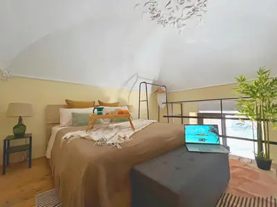 Letto o letti in una camera di Giatì Studio - Cortile Privato & Metro