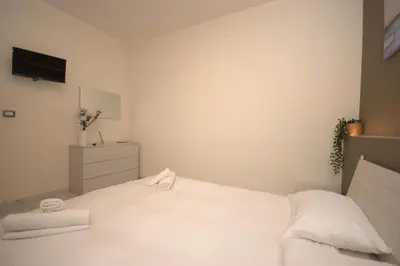 Letto o letti in una camera di Una Vita Vista Mare