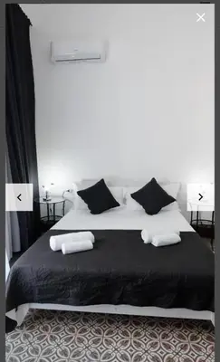 Letto o letti in una camera di Appartamento Holiday Catania