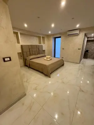 Letto o letti in una camera di Bquadro suite