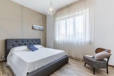 Letto o letti in una camera di Suite Giulia - Luxury apartment in the heart of Giarre