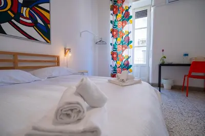 Letto o letti in una camera di Living Simply