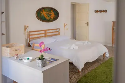 Letto o letti in una camera di Living Simply