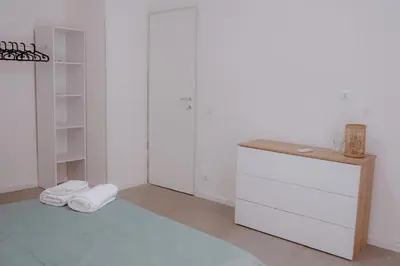 Letto o letti in una camera di Casa vacanze Le farfalle