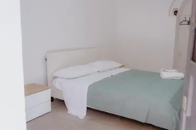Letto o letti in una camera di Casa vacanze Le farfalle