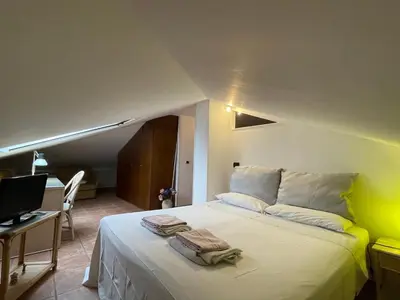 Letto o letti in una camera di Casa Via Vigo