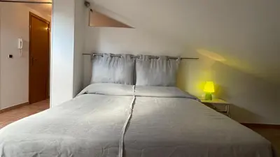 Letto o letti in una camera di Casa Via Vigo