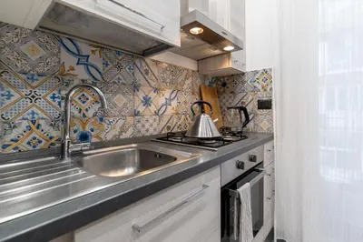 Cucina o angolo cottura di I Miti DellEtna - Aci e Galatea1 by Harmony H...