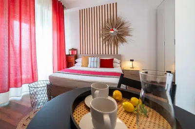 Letto o letti in una camera di I Miti DellEtna - Aci e Galatea1 by Harmony H...