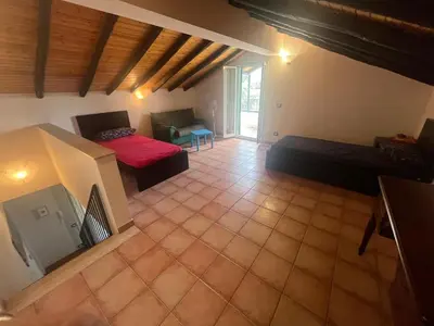 Letto o letti in una camera di Etna Beach House