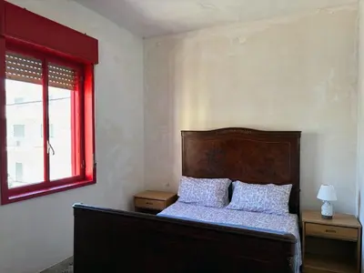 Letto o letti in una camera di Terrazza delle Acacie