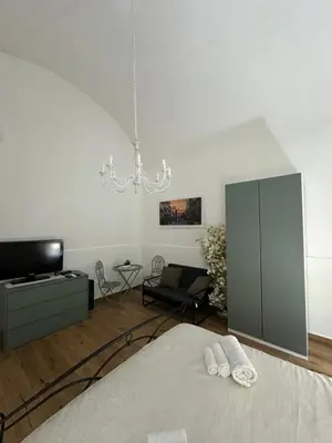 Letto o letti in una camera di Bentihome
