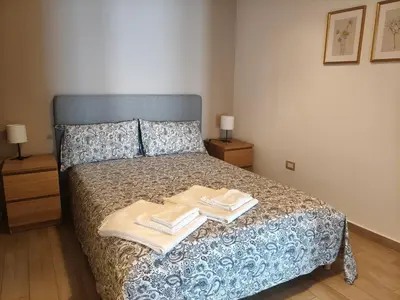 Letto o letti in una camera di Anapo Home