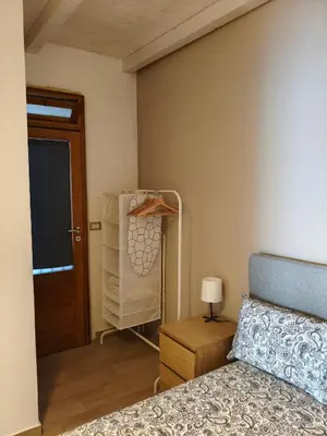 Letto o letti in una camera di Anapo Home