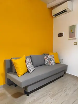 Area soggiorno di Anapo Home