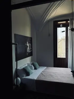 Letto o letti in una camera di Stanze di Agatha