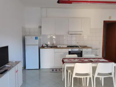 Cucina o angolo cottura di INCANTO DI MARE - Fondachello apartments