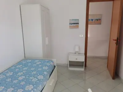 Letto o letti in una camera di INCANTO DI MARE - Fondachello apartments