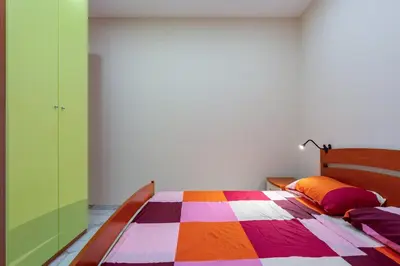 Letto o letti in una camera di GuestHost - Isole Ciclopi View - Lovely Apartment