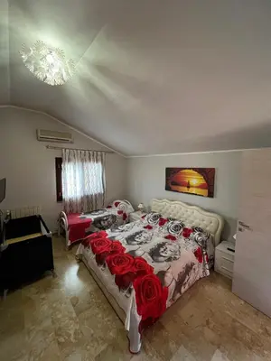 Letto o letti in una camera di Casa Vacanze Volpe Dell'Etna