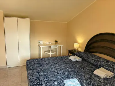 Letto o letti in una camera di La mia dolce casa
