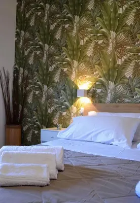 Letto o letti in una camera di Casa D'Amuri