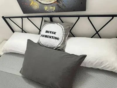 Letto o letti in una camera di House Fiorentino
