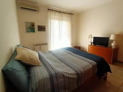 Letto o letti in una camera di Villa Mariposa