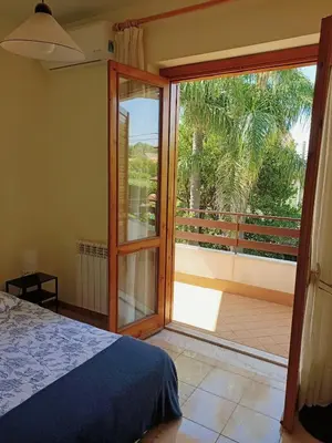 Letto o letti in una camera di Villa Mariposa