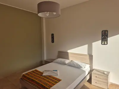 Letto o letti in una camera di Casa Egle - Between Etna and the sea