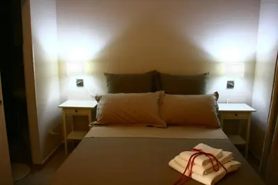 Letto o letti in una camera di B&B Il Vulcano