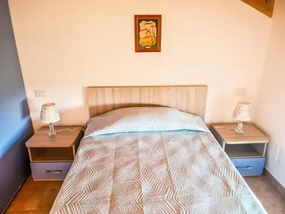 Letto o letti in una camera di La Casa del Cedro