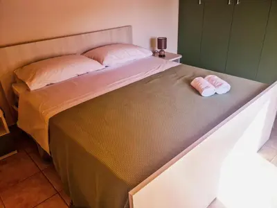 Letto o letti in una camera di La Casa del Cedro
