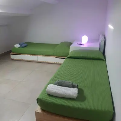 Letto o letti in una camera di Il Cortile