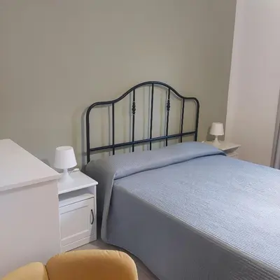 Letto o letti in una camera di Il Cortile