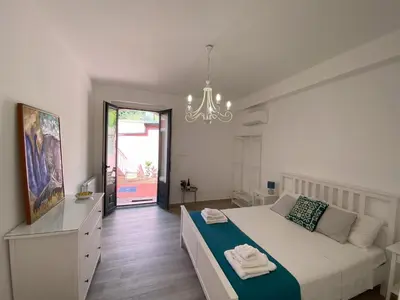 Letto o letti in una camera di Le corti dell'Etna